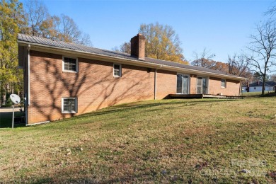 This full brick ranch home featuring 3 bedrooms, 2 full on Club At Irish Creek in North Carolina - for sale on GolfHomes.com, golf home, golf lot