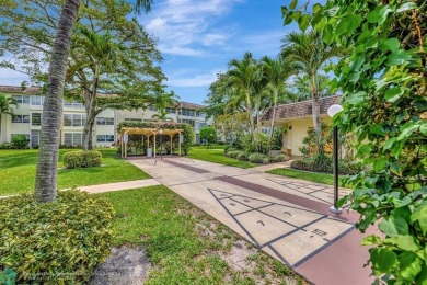 Charming 2 bedroom 2 bathroom condo located in the desirable on Inverrary Country Club in Florida - for sale on GolfHomes.com, golf home, golf lot