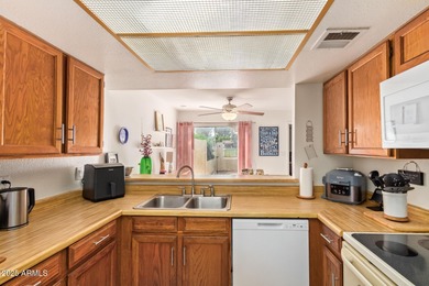This charming 2 Master bedroom, 2-bath home nestled on a Golf on Ahwatukee Country Club in Arizona - for sale on GolfHomes.com, golf home, golf lot