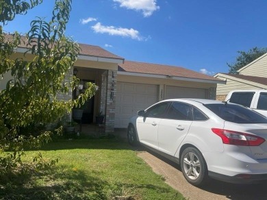 This 3 bedroom 2 bath house in Grand Prairie has a open-concept on Prairie Lakes Golf Club in Texas - for sale on GolfHomes.com, golf home, golf lot