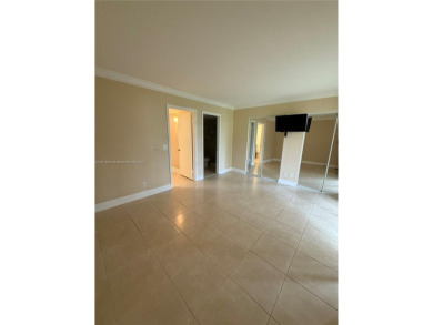 First floor unit! Resort Style 55+ community in Pembroke Pines on Flamingo Lakes Country Club in Florida - for sale on GolfHomes.com, golf home, golf lot