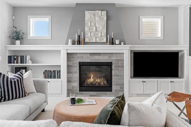 Discover refined living in this former NIH Custom Builders on Rush Creek Golf Club in Minnesota - for sale on GolfHomes.com, golf home, golf lot