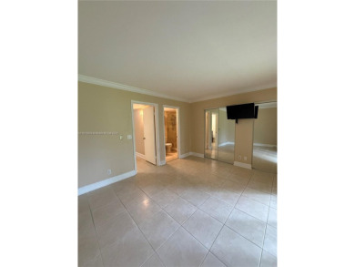 First floor unit! Resort Style 55+ community in Pembroke Pines on Flamingo Lakes Country Club in Florida - for sale on GolfHomes.com, golf home, golf lot