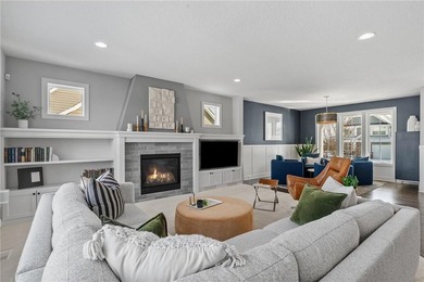 Discover refined living in this former NIH Custom Builders on Rush Creek Golf Club in Minnesota - for sale on GolfHomes.com, golf home, golf lot