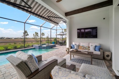 Picture yourself unwinding on your covered western-facing lanai on Calusa Lakes Golf Club in Florida - for sale on GolfHomes.com, golf home, golf lot