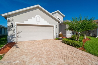 Golf lover's paradise! Nestled in a gated community along the on Viera East Golf Club in Florida - for sale on GolfHomes.com, golf home, golf lot