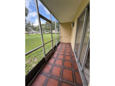 First floor unit! Resort Style 55+ community in Pembroke Pines on Flamingo Lakes Country Club in Florida - for sale on GolfHomes.com, golf home, golf lot