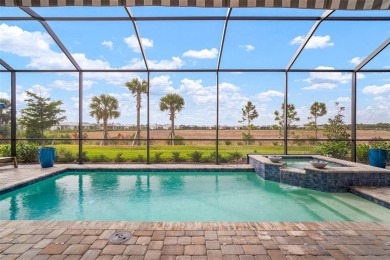 Picture yourself unwinding on your covered western-facing lanai on Calusa Lakes Golf Club in Florida - for sale on GolfHomes.com, golf home, golf lot