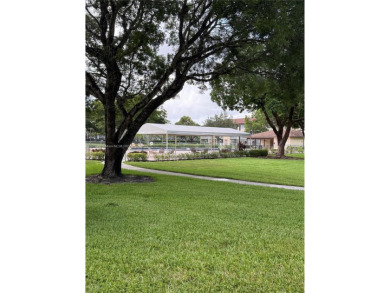 First floor unit! Resort Style 55+ community in Pembroke Pines on Flamingo Lakes Country Club in Florida - for sale on GolfHomes.com, golf home, golf lot