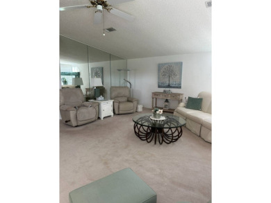 Discover Golf Course Perfection: Fully Furnished 2-Bedroom Palm on Schalamar Creek Golf and Country Club in Florida - for sale on GolfHomes.com, golf home, golf lot