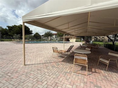 First floor unit! Resort Style 55+ community in Pembroke Pines on Flamingo Lakes Country Club in Florida - for sale on GolfHomes.com, golf home, golf lot