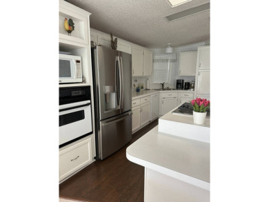 Discover Golf Course Perfection: Fully Furnished 2-Bedroom Palm on Schalamar Creek Golf and Country Club in Florida - for sale on GolfHomes.com, golf home, golf lot