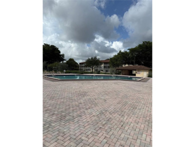 First floor unit! Resort Style 55+ community in Pembroke Pines on Flamingo Lakes Country Club in Florida - for sale on GolfHomes.com, golf home, golf lot