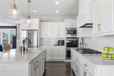 Discover refined living in this former NIH Custom Builders on Rush Creek Golf Club in Minnesota - for sale on GolfHomes.com, golf home, golf lot