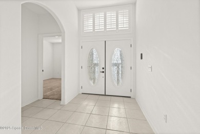 Golf lover's paradise! Nestled in a gated community along the on Viera East Golf Club in Florida - for sale on GolfHomes.com, golf home, golf lot