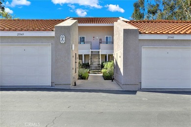 Welcome to this spacious 3-bedroom, 2-bath upper-level condo on Mission Viejo Country Club in California - for sale on GolfHomes.com, golf home, golf lot