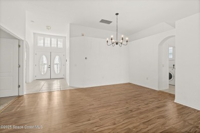 Golf lover's paradise! Nestled in a gated community along the on Viera East Golf Club in Florida - for sale on GolfHomes.com, golf home, golf lot