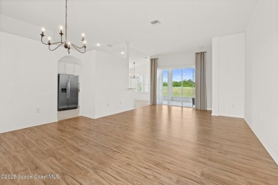 Golf lover's paradise! Nestled in a gated community along the on Viera East Golf Club in Florida - for sale on GolfHomes.com, golf home, golf lot