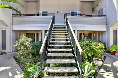 Welcome to this spacious 3-bedroom, 2-bath upper-level condo on Mission Viejo Country Club in California - for sale on GolfHomes.com, golf home, golf lot