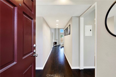 Welcome to this spacious 3-bedroom, 2-bath upper-level condo on Mission Viejo Country Club in California - for sale on GolfHomes.com, golf home, golf lot