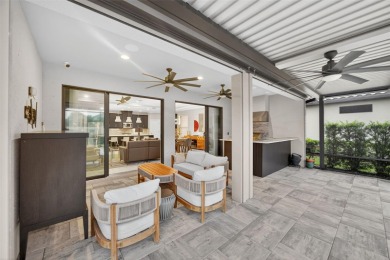 Impeccably Upgraded Piceno Model | 2BR + Den | Outdoor Oasis on Esplanade Golf and Country at Lakewood Ranch in Florida - for sale on GolfHomes.com, golf home, golf lot