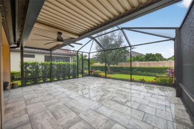 Impeccably Upgraded Piceno Model | 2BR + Den | Outdoor Oasis on Esplanade Golf and Country at Lakewood Ranch in Florida - for sale on GolfHomes.com, golf home, golf lot