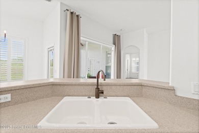 Golf lover's paradise! Nestled in a gated community along the on Viera East Golf Club in Florida - for sale on GolfHomes.com, golf home, golf lot