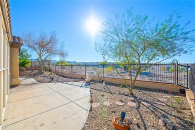 Nestled within the ultra-exclusive, guard-gated enclave of on Laughlin Ranch Golf Club in Arizona - for sale on GolfHomes.com, golf home, golf lot