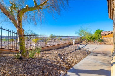 Nestled within the ultra-exclusive, guard-gated enclave of on Laughlin Ranch Golf Club in Arizona - for sale on GolfHomes.com, golf home, golf lot