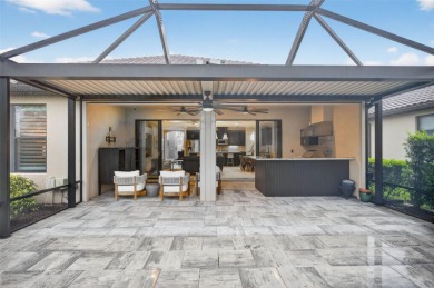 Impeccably Upgraded Piceno Model | 2BR + Den | Outdoor Oasis on Esplanade Golf and Country at Lakewood Ranch in Florida - for sale on GolfHomes.com, golf home, golf lot
