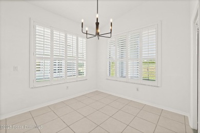 Golf lover's paradise! Nestled in a gated community along the on Viera East Golf Club in Florida - for sale on GolfHomes.com, golf home, golf lot