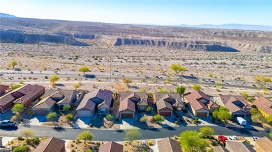Nestled within the ultra-exclusive, guard-gated enclave of on Laughlin Ranch Golf Club in Arizona - for sale on GolfHomes.com, golf home, golf lot