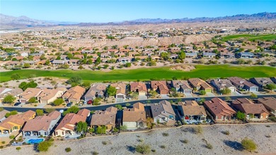 Nestled within the ultra-exclusive, guard-gated enclave of on Laughlin Ranch Golf Club in Arizona - for sale on GolfHomes.com, golf home, golf lot