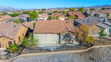 Nestled within the ultra-exclusive, guard-gated enclave of on Laughlin Ranch Golf Club in Arizona - for sale on GolfHomes.com, golf home, golf lot