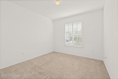 Golf lover's paradise! Nestled in a gated community along the on Viera East Golf Club in Florida - for sale on GolfHomes.com, golf home, golf lot