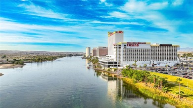 Nestled within the ultra-exclusive, guard-gated enclave of on Laughlin Ranch Golf Club in Arizona - for sale on GolfHomes.com, golf home, golf lot
