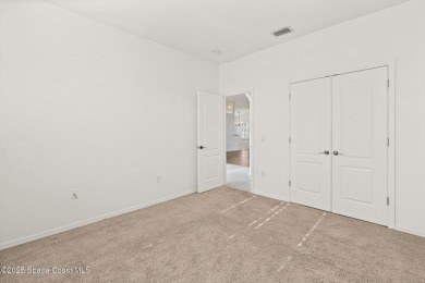 Golf lover's paradise! Nestled in a gated community along the on Viera East Golf Club in Florida - for sale on GolfHomes.com, golf home, golf lot