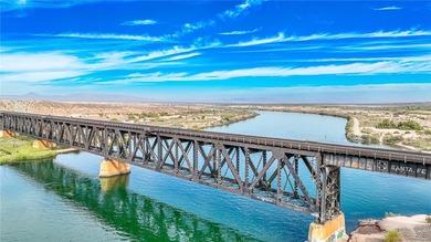 Nestled within the ultra-exclusive, guard-gated enclave of on Laughlin Ranch Golf Club in Arizona - for sale on GolfHomes.com, golf home, golf lot