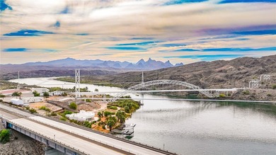 Nestled within the ultra-exclusive, guard-gated enclave of on Laughlin Ranch Golf Club in Arizona - for sale on GolfHomes.com, golf home, golf lot