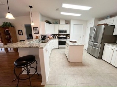 This PARTIALLY furnished split, open plan, 3bd, 2ba LAKE VIEW on Del Tura Golf and Country Club in Florida - for sale on GolfHomes.com, golf home, golf lot