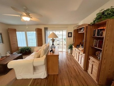 This PARTIALLY furnished split, open plan, 3bd, 2ba LAKE VIEW on Del Tura Golf and Country Club in Florida - for sale on GolfHomes.com, golf home, golf lot