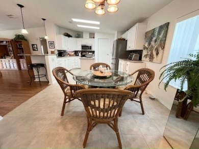 This PARTIALLY furnished split, open plan, 3bd, 2ba LAKE VIEW on Del Tura Golf and Country Club in Florida - for sale on GolfHomes.com, golf home, golf lot