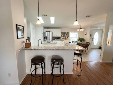 This PARTIALLY furnished split, open plan, 3bd, 2ba LAKE VIEW on Del Tura Golf and Country Club in Florida - for sale on GolfHomes.com, golf home, golf lot
