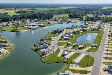 Escape to effortless lakeside luxury on Lot 122 at Lake Osprey on Soldiers Creek Golf Club At Woerner Preserve in Alabama - for sale on GolfHomes.com, golf home, golf lot