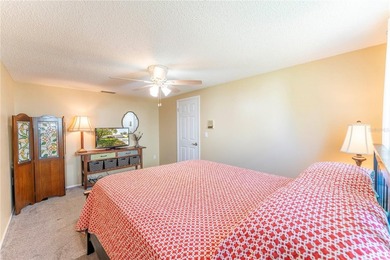 Welcome to this spacious 3-bedroom, 2-bathroom split-plan home on Beacon Woods Golf Club in Florida - for sale on GolfHomes.com, golf home, golf lot