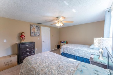 Welcome to this spacious 3-bedroom, 2-bathroom split-plan home on Beacon Woods Golf Club in Florida - for sale on GolfHomes.com, golf home, golf lot