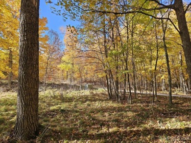 Envision your dream home nestled amidst the serene beauty of the on Garden Golf Course in Michigan - for sale on GolfHomes.com, golf home, golf lot