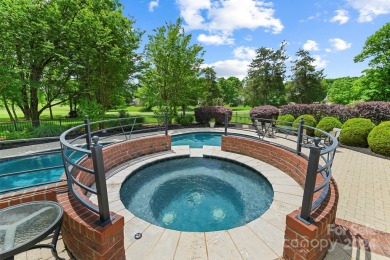 Experience luxury living at its absolute finest in this on The Divide Golf Club in North Carolina - for sale on GolfHomes.com, golf home, golf lot