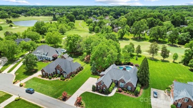 Experience luxury living at its absolute finest in this on The Divide Golf Club in North Carolina - for sale on GolfHomes.com, golf home, golf lot