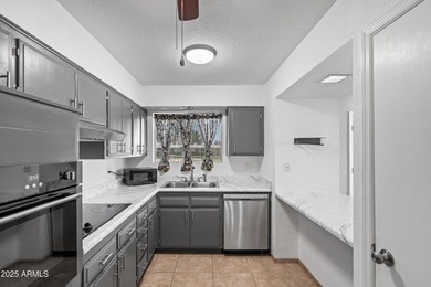 Charming Sun City home in a 55+ community! Enjoy a bright great on Sun City South Golf Course in Arizona - for sale on GolfHomes.com, golf home, golf lot